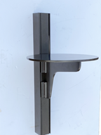 Modern black wall-mounted shelf on white background.