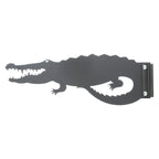 Black metal alligator silhouette wall decoration.
