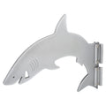 Shark-shaped metallic wall mount bottle opener.
