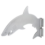 Shark-shaped metallic wall mount bottle opener.